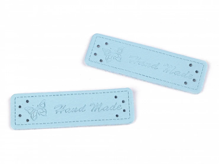 Hand made, perhonen, vaaleansininen, ompelumerkki