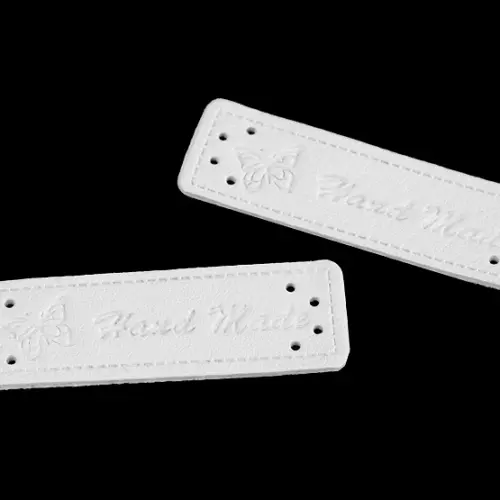 Hand made, perhonen, valkoinen, ompelumerkki